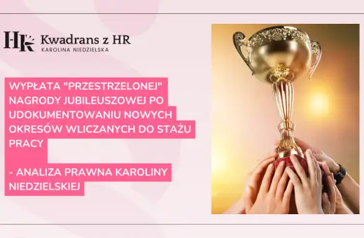 Złoty puchar w dłoniach symbolizuje nagrodę jubileuszową za 20 lat pracy. Analiza prawna Karolina Niedzielskiej.