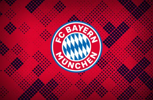 Herb FC Bayern Monachium na tle czerwono-granatowych kropek. Duma Bawarii.
