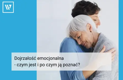 Dwie kobiety w uścisku, symbolizujące dojrzałość emocjonalną i wsparcie.