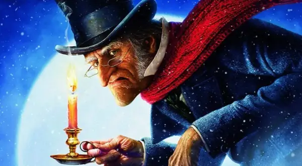 Ebenezer Scrooge, w cylindrze i szaliku, trzyma świecę. Czy znasz tę historię? Quizy opowieść wigilijna.