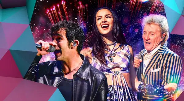 Matty Healy, Olivia Rodrigo, and Rod Stewart perform on stage with fireworks in the background, a vibrant montage celebrating BBC Glastonbury.