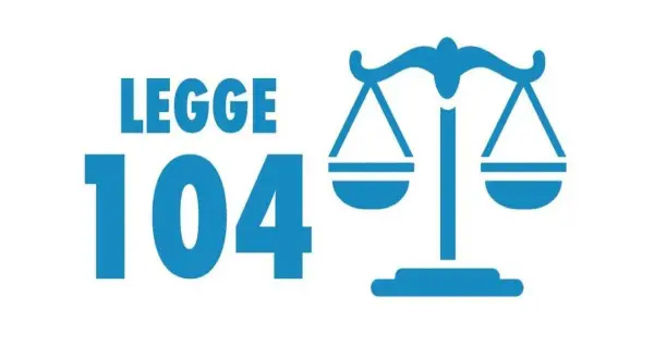 Bilancia della giustizia accanto a "LEGGE 104".
