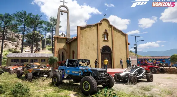 Wiele terenowych pojazdów przed kościołem w Meksyku. Idealna grafika, by sprawdzić forza horizon 5 wymagania.