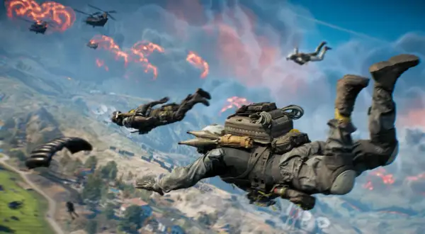 Żołnierze skaczą ze spadochronami nad płonącym polem bitwy. To intensywny battlefield battle royale.