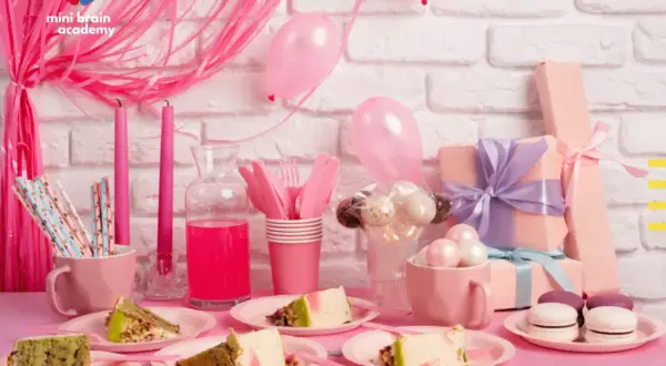 Różowy zestaw urodzinowy dla dziewczynki: torty, prezenty, balony i słodkości.