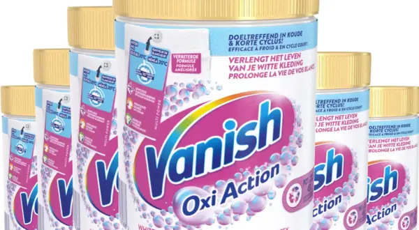 Kilka opakowań proszku do prania Vanish Oxi Action z żółtymi nakrętkami.