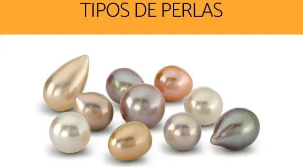 Variedad de tipos de perlas naturales, redondas y en forma de lágrima, en tonos blanco, rosa, dorado y grisáceo.