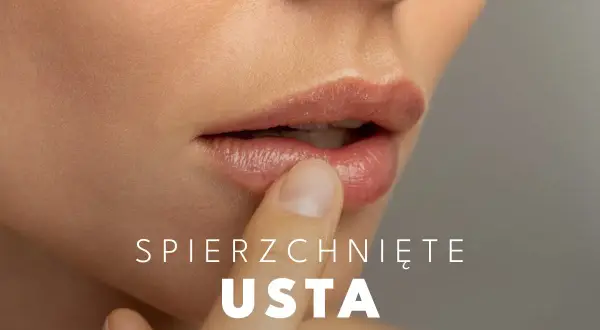 Delikatne usta dotykane palcem, szukające ukojenia. Co na suche usta?