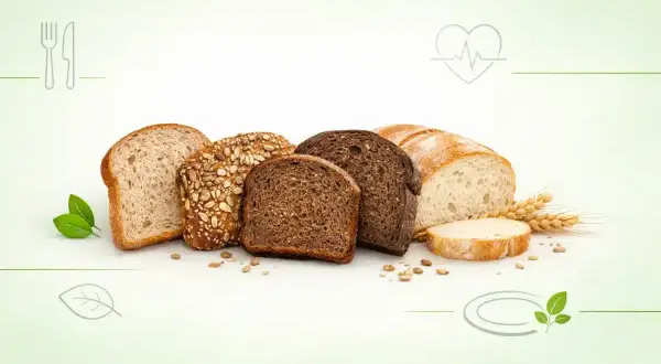 Różne rodzaje chleba, od jasnego po ciemny, z ziarnami. Zastanawiasz się, jaki chleb ma najmniej kalorii? Wybierz świadomie!