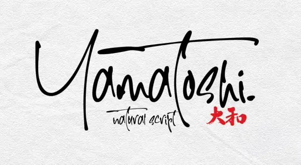 Yamatoshi" in a flowing, natural script, with "natural script" below and Japanese characters in red. A beautiful example of Japanese English font.