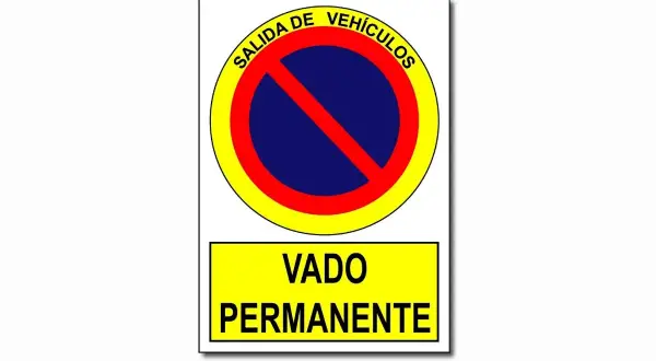 Señal de "Salida de Vehículos" y "Vado Permanente", indicando que es un vado señalizado y no se puede aparcar.
