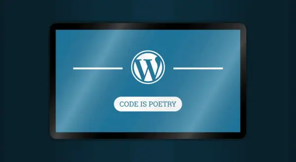 Logo WordPress na ekranie tabletu. Pod nim napis "CODE IS POETRY". To jest właśnie wordpress co to.