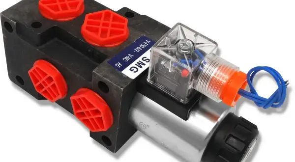 Elektrozawór pneumatyczny SMG z czerwonymi zaślepkami. Dowiedz się, jak sprawdzić elektrozawór, gdy potrzebujesz diagnostyki.