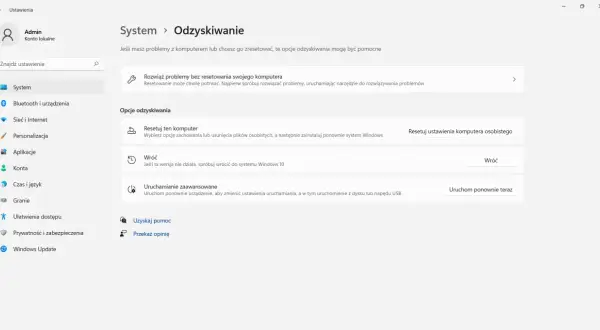 Opcje odzyskiwania systemu Windows. Jeśli chcesz wrócić do Windows 10, wybierz "Wróć".
