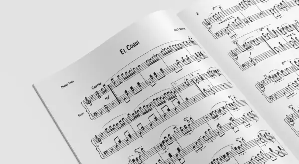 Otwarta partytura "El Coqui" dla pianisty solo. Nuty wypełniają strony, zapraszając do wykonania tej muzycznej ody.