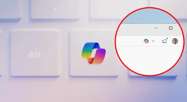 Klawiatura z klawiszem "Alt" i tęczowym logo. W okręgu widać okno z ikonami, w tym przypominającą Cortanę z Windows 10.