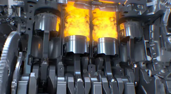 Vue en coupe d'un moteur thermique, montrant les pistons en action avec des flammes vives. Le mécanisme complexe du vilebrequin et des bielles est visible.