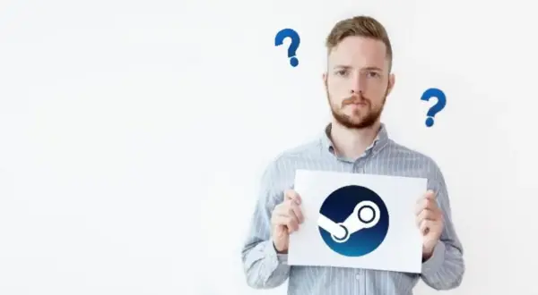 Mężczyzna trzyma kartkę z logo Steam, otoczony znakami zapytania.