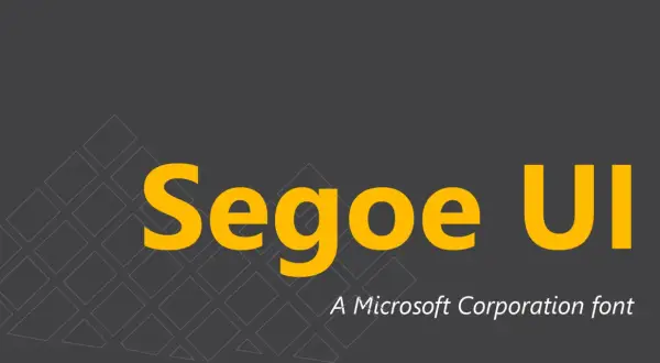 Segoe UI, czcionka Microsoftu, prezentowana na ciemnoszarym tle z geometrycznym wzorem.