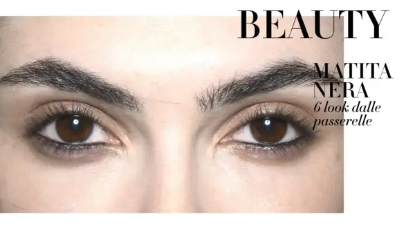 Occhi con un look grunge makeup, evidenziati da matita nera e ciglia folte.