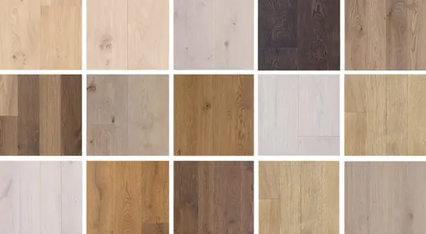 Variedad de tablones de madera de roble en distintos tonos, desde claros hasta oscuros, mostrando la belleza natural del color roble madera.