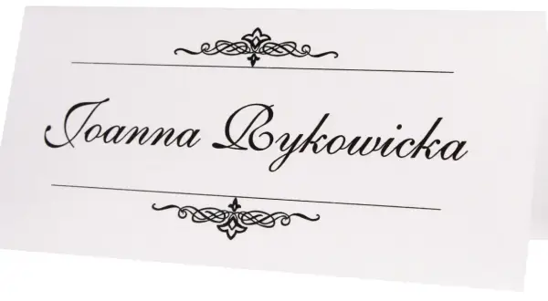 Elegancka winietka z imieniem "Joanna Bykowicz" ozdobiona ornamentami. Idealna inspiracja, jak zrobić winietki na przyjęcie.