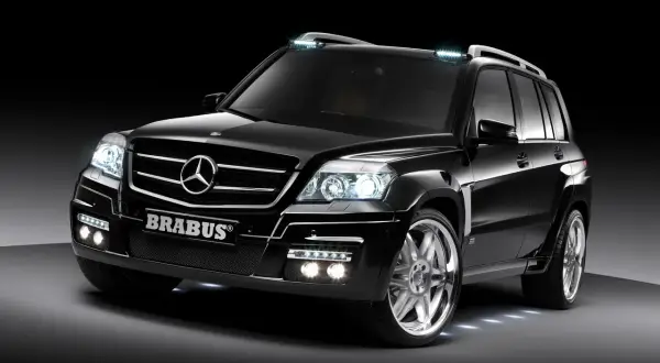 Svart Mercedes GLK 220 med Brabus-styling och extra LED-lampor. En potentiell mercedes glk 220 problem kan vara att den är för snygg.