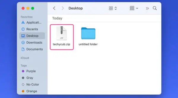 Jak rozpakować zip? Na pulpicie widoczny plik "techycub.zip" i folder. Kliknij dwukrotnie, by rozpakować.