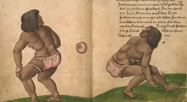 Ilustracja przedstawia dwie postacie grające w piłkę, z tekstem w języku niemieckim.