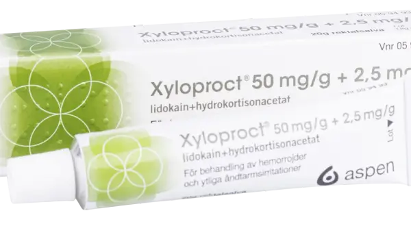 Xyloproct salva mot hemorrojder. Förpackning och tub med salva för behandling av hemorrojder och ändtarmsirritationer.