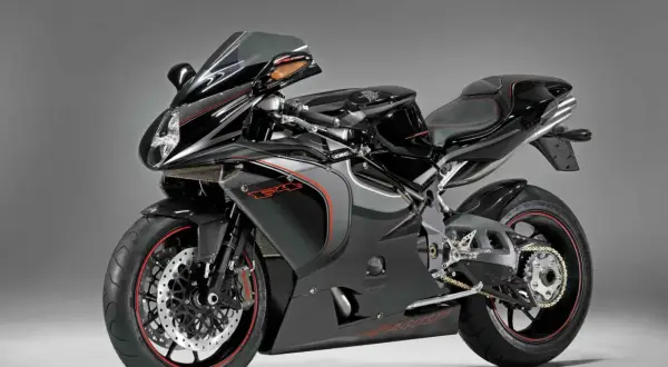 Una moto deportiva negra con detalles rojos, símbolo de potencia y lujo. Estas motos caras son un sueño para muchos.