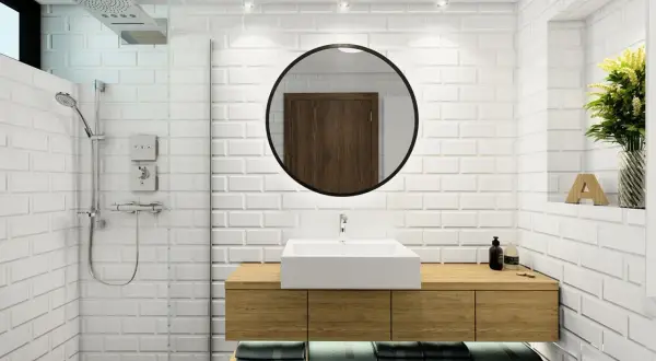 Baño moderno con ducha abierta y lavabo sobre mueble de madera. Explora alternativas a las mamparas de baño para un diseño minimalista.