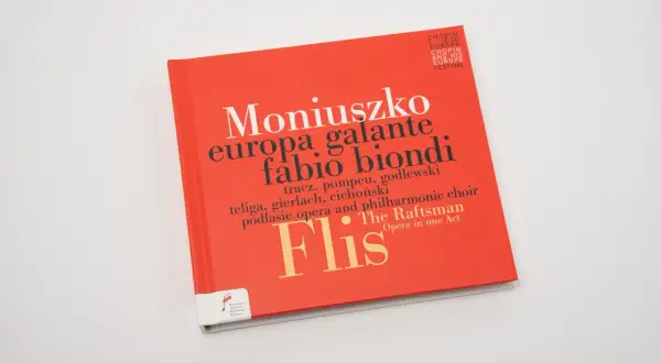 Okładka książki o operach Moniuszki, z tytułem "Moniuszko europa galante fabio biondi" i nazwą opery "Flis".