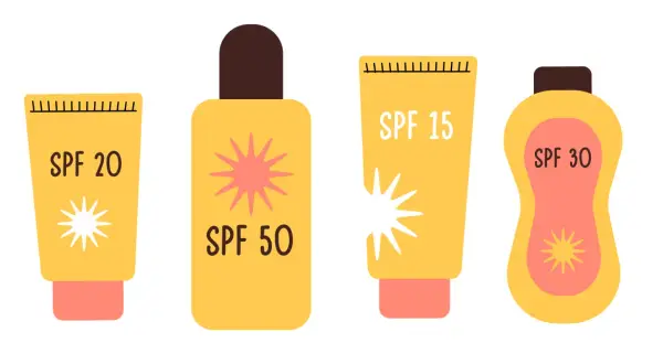 Cztery żółte opakowania kremów z filtrem: SPF 20, SPF 50, SPF 15 i SPF 30. Wybierz odpowiedni filtr do opalania dla swojej skóry.