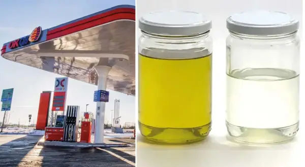 OKQ8-mack med pumpar och två burkar med vätska, en gul och en klar, som kan vara diesel.