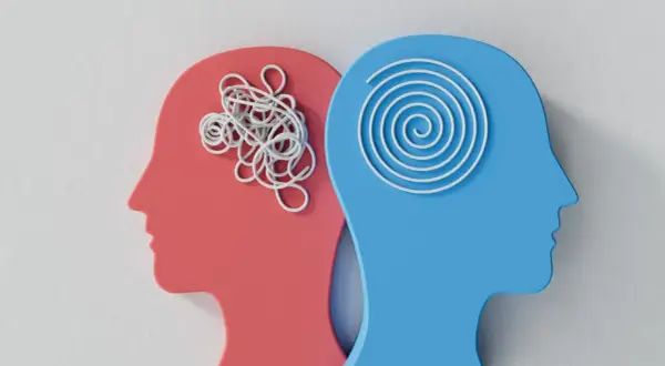 Zwei Kopfprofile: Rot mit chaotischem Garn, Blau mit Spirale. Ein Bild, um mental health verbessern.