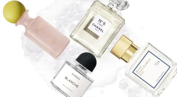 Perfumy Maison Francis Kurkdjian 724, Chanel N°5 L'Eau, Byredo Blanche i La Perla Invisible Touch na tle bąbelków.