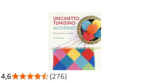 Uncinetto tunisino moderno: un libro con gomitoli colorati e un campione a rombi.