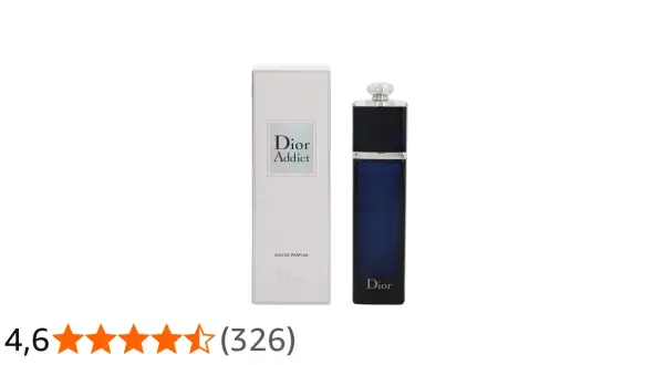 Elegancki flakon Dior Addict EDP w granatowym kolorze obok swojego białego opakowania.
