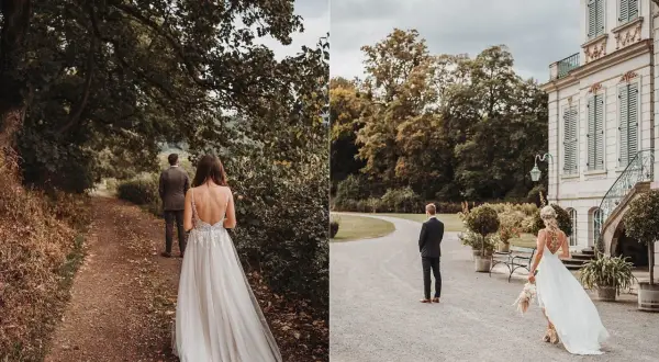 Brautpaar im first look shooting. Sie nähern sich einander auf einem Weg vor einem Schloss.