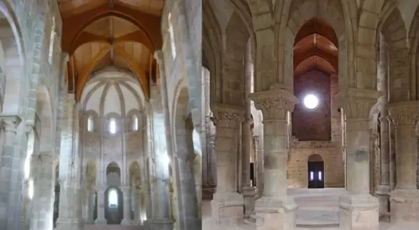 Interior del monasterio de Carboeiro, con arcos de piedra, bóvedas y un techo de madera.