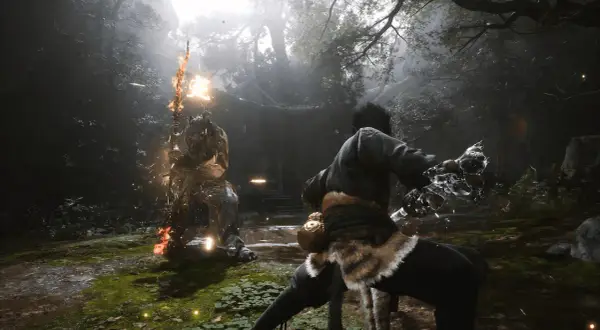 Wukong im Kampf gegen einen feurigen Gegner im Wald. Ein epischer Moment aus Black Myth: Wukong.