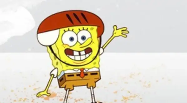 SpongeBob Kanciastoporty w kasku, macha ręką. Jedna z ulubionych spongebob postacie, gotowa na przygodę!