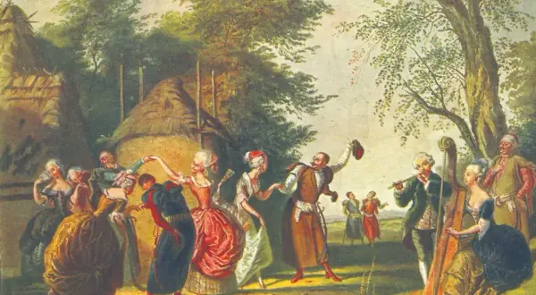 Barwny taniec ludowy przy akompaniamencie muzyki. W tle widać chaty kryte strzechą, a na pierwszym planie tańczący ludzie w strojach z epoki. Nie ma tu żadnego posągu.