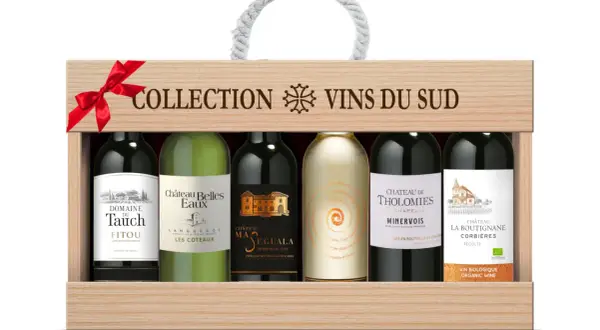 Cofanetto in legno con sei bottiglie di vino, un omaggio alla regione vinicola francese del Sud.