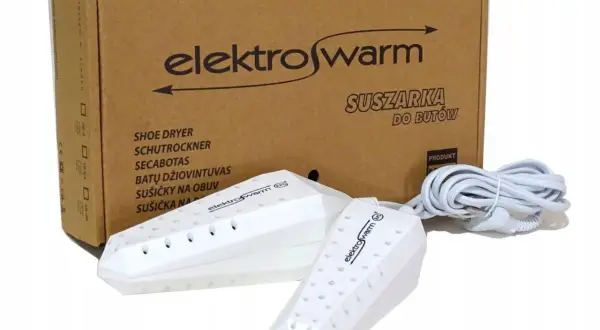 Biała suszarka do butów narciarskich ElektroWarm z kablem, gotowa do użycia po całym dniu na stoku.