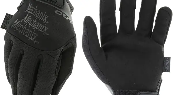 Un par de guantes anticorte Mechanix negros, listos para proteger tus manos en cualquier tarea.