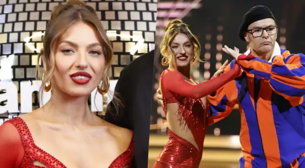 Izabela Skierska w czerwonej sukience tańczy z partnerem w stroju cyrkowym.