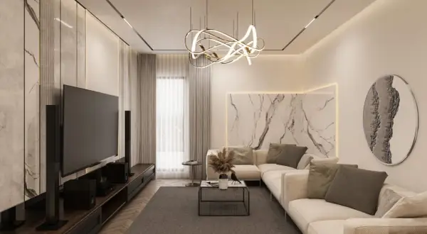 Nowoczesny salon z designerską lampą i subtelnym oświetleniem LED. Idealne, jakie oświetlenie do salonu, by stworzyć przytulną atmosferę.