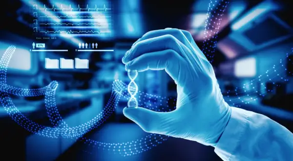 Rękawiczka laboratoryjna trzyma model DNA, symbolizując przełomowe esaliens medycyny i nowych technologii.